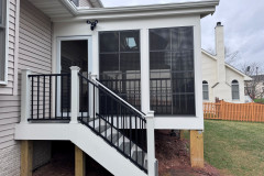 Side landing with stairs to the yard.