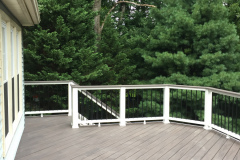 Deck in Wolf Black Walnut decking and Trex Transcends railing - Fairfax, VA