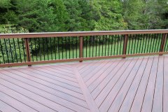 Decking in Wolf Rosewood and black Deckorator balusters in Gainesville, VA