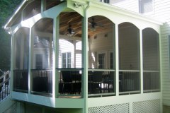 Screen porch and deck in Wolf Amberwood decking. Trex Transcends railing - Annandale, VA