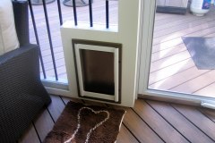 Screen porch and deck in Wolf Amberwood decking. Trex Transcends railing - Annandale, VA