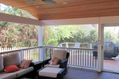 Screen porch in Wolf Rosewood decking and Trex Transcends railing - Arlington, VA