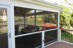 Screen porch in Wolf Rosewood decking and Trex Transcends railing - Arlington, VA