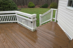 Deck in Wolf Amberwood decking, Trex Signature railing - Fairfax, VA