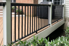 Deck in Wolf Amberwood decking, Trex Signature railing - Fairfax, VA
