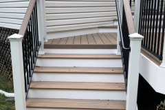 Deck in Wolf Amberwood decking, Trex Signature railing - Fairfax, VA