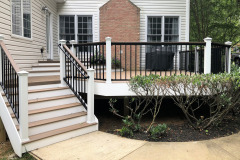 Deck in Wolf Amberwood decking, Trex Signature railing - Fairfax, VA