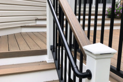 Deck in Wolf Amberwood decking, Trex Signature railing - Fairfax, VA