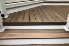 Deck in Wolf Amberwood decking, Trex Signature railing - Fairfax, VA