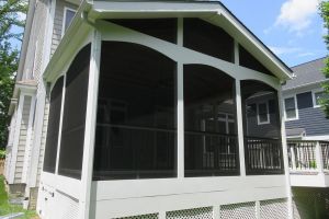 Screen porch and deck in Wolf Black Walnut, Trex Transcends rail - Arlington, VA