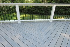 Annandale deck with Wolf Silver Teak decking and Trex Transcends railing.
