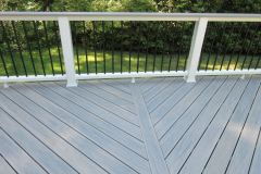 Annandale deck with Wolf Silver Teak decking and Trex Transcends railing.