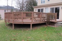 Annandale deck with Wolf Silver Teak decking and Trex Transcends railing.