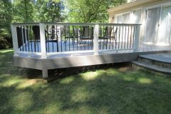 Annandale deck with Wolf Silver Teak decking and Trex Transcends railing.