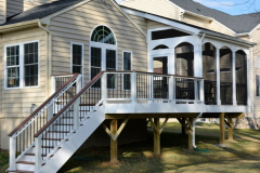 Screen porch in Wolf Rosewood decking. Trex Transcends railing - Alexandria, VA