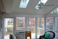 Screen porch with Eze Breeze windows and wood stairs - Annandale, VA