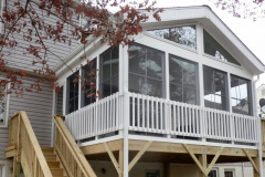 Screen porch with Eze Breeze windows and wood stairs - Annandale, VA