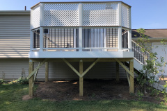 Wolf Amberwood deck with Trex Transcends railing - Herndon, VA
