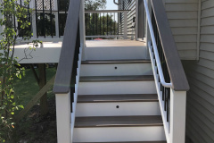 Wolf Amberwood deck with Trex Transcends railing - Herndon, VA