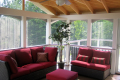 Screen porch and deck in Wolf Amberwood and Rosewood decking. Trex Transcends railing - Woodbridge, VA