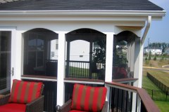 Screen porch and deck in Wolf Amberwood and Rosewood decking. Trex Transcends railing - Woodbridge, VA