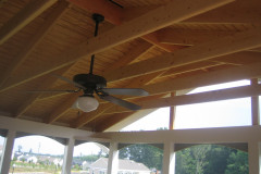 Screen porch and deck in Wolf Amberwood and Rosewood decking. Trex Transcends railing - Woodbridge, VA