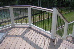 Screen porch and deck in Wolf Amberwood and Rosewood decking. Trex Transcends railing - Woodbridge, VA